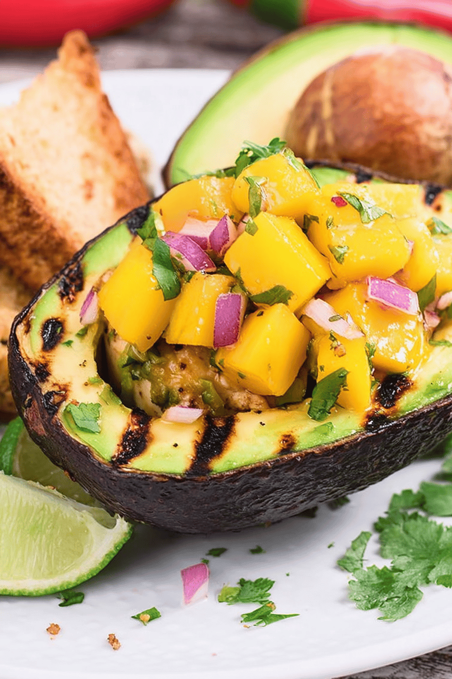 Grilled Avocado Stuffed with Mango Chicken