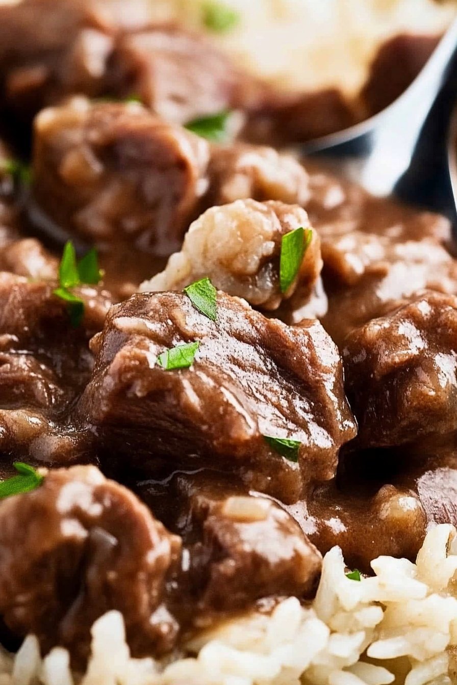Tender Slow Cooked Beef Over Rice