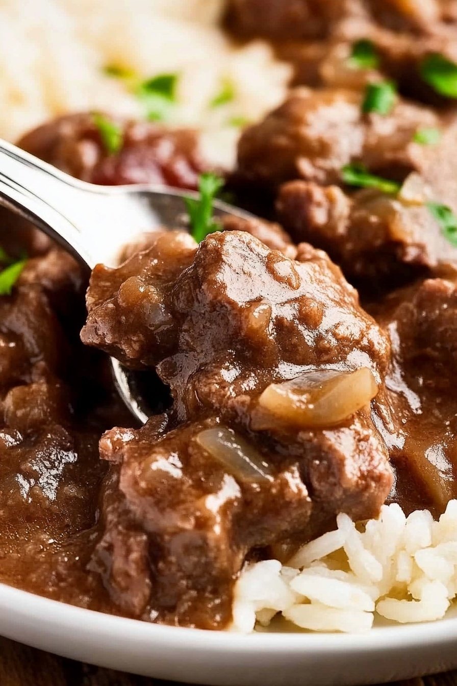Tender Slow Cooked Beef Over Rice