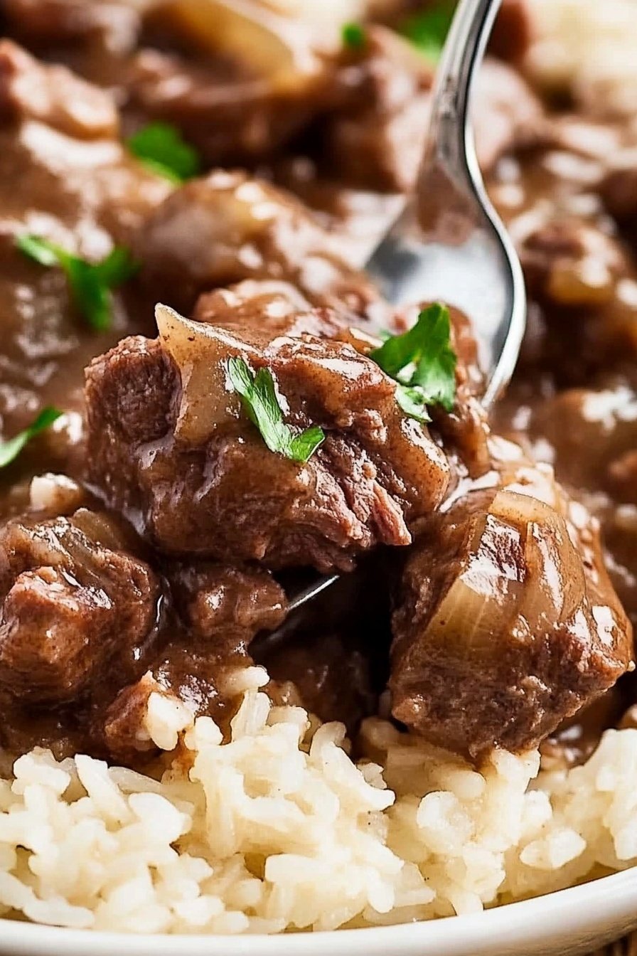 Tender Slow Cooked Beef Over Rice