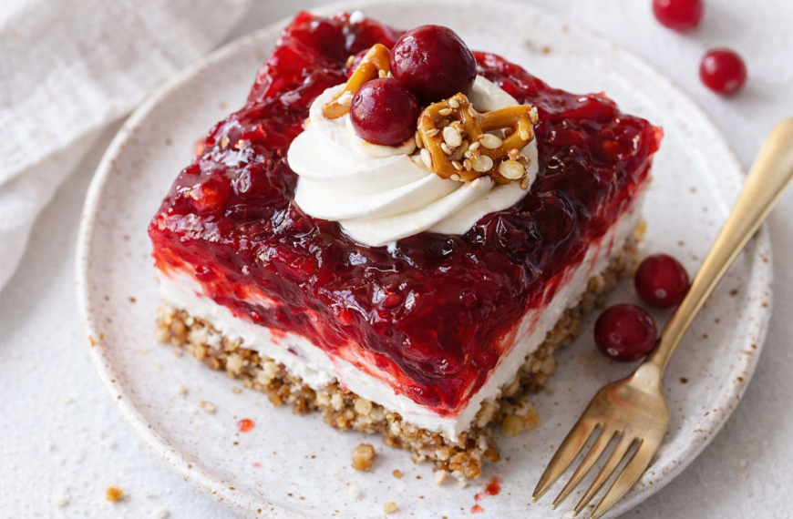 A layered holiday dessert with a sweet, salty pretzel crust, creamy&hellip;